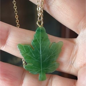 Canadian natural nephrite jade carved maple leaf pendant and gold tone chain